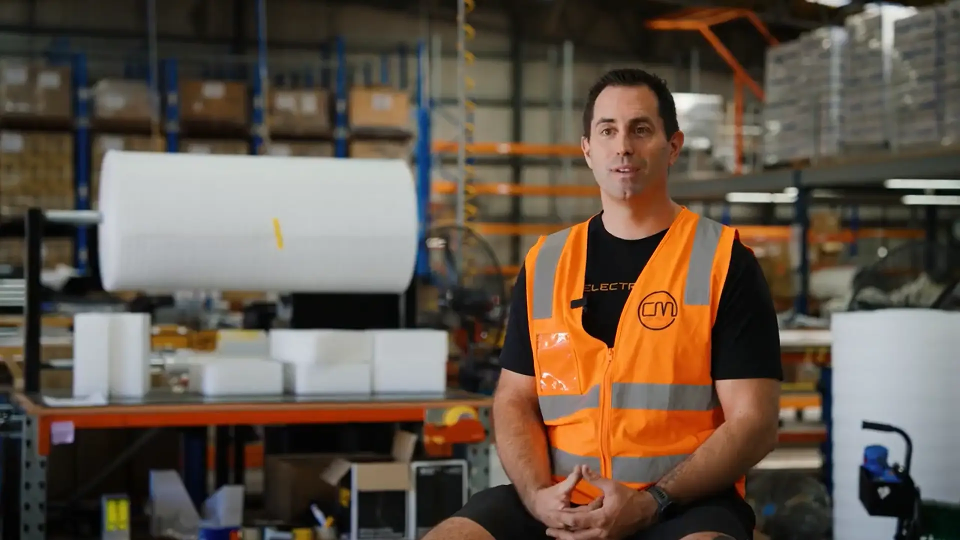 CM Electrical technician explaining Brisbane commercial Mammoth Fans installation
