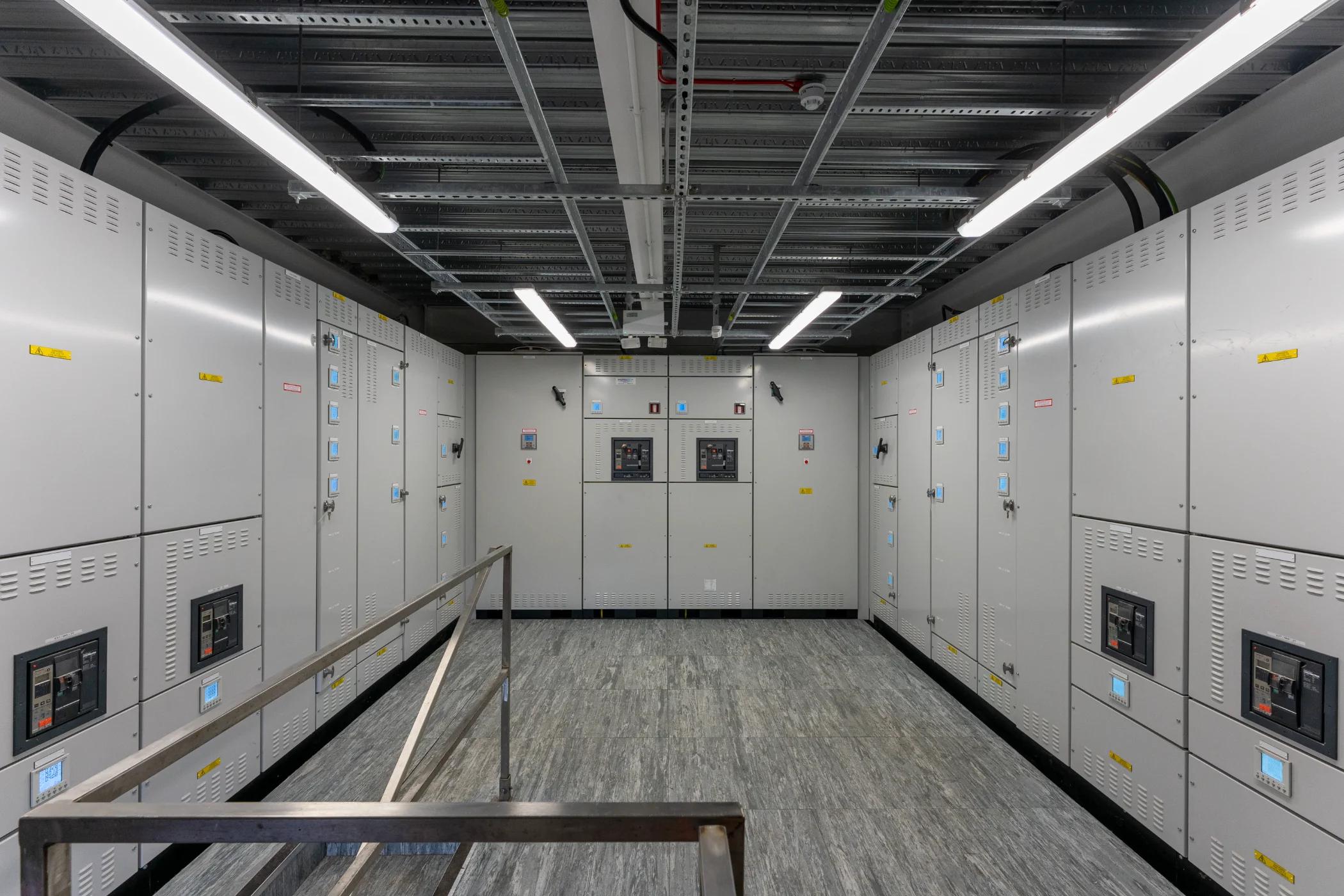 Modern commercial electrical room with distribution boards and organized electrical infrastructure