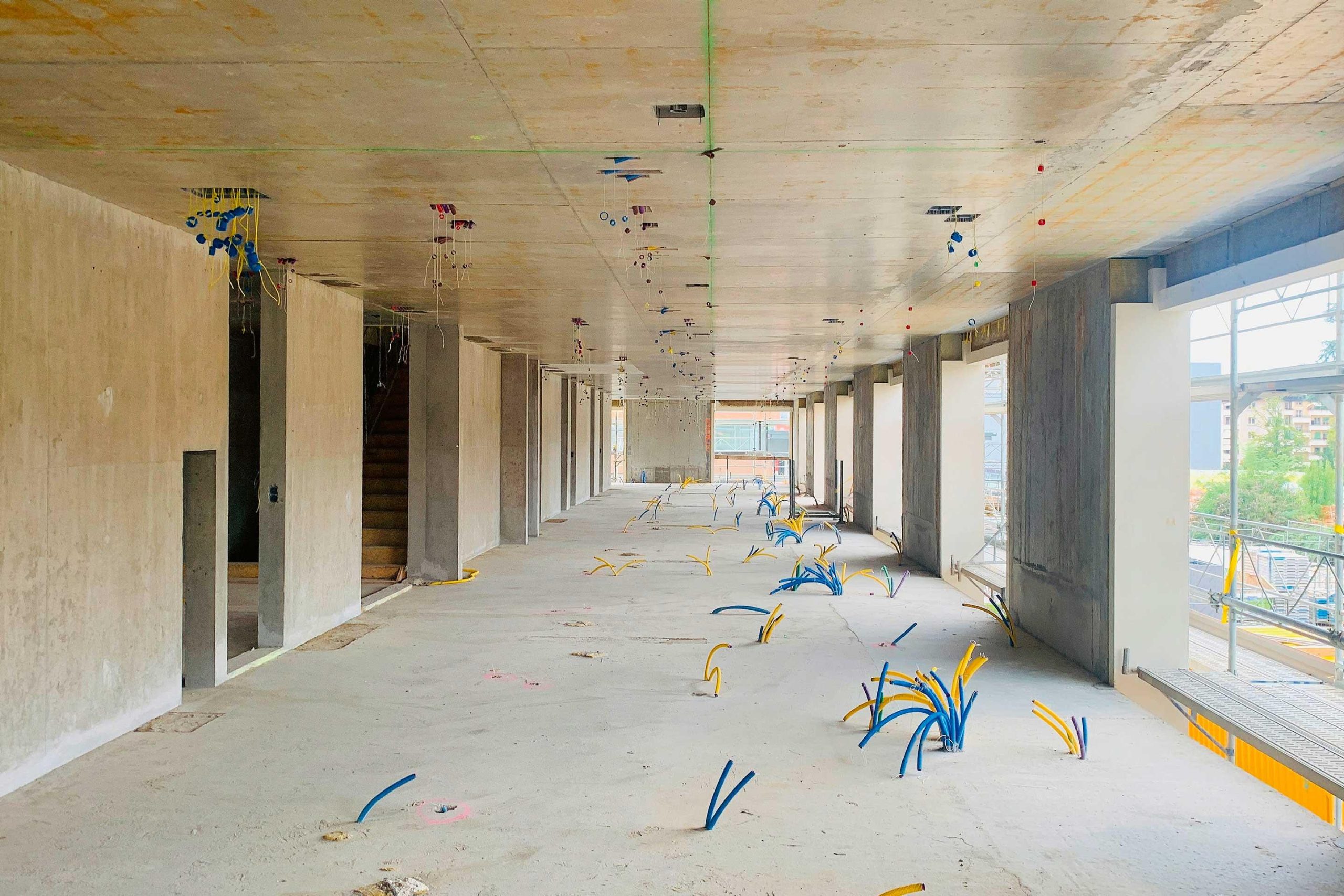 Commercial electrical rough-in installation before wall construction